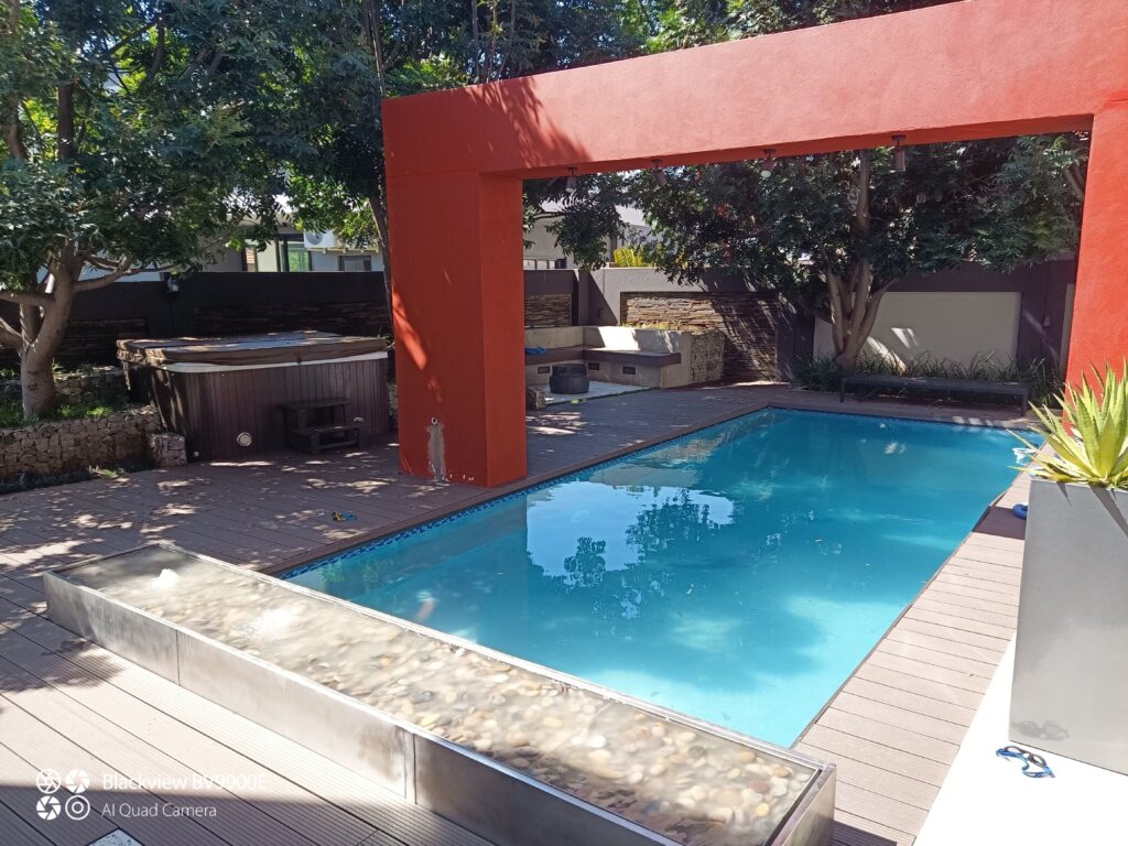 "modern back garden with pool"